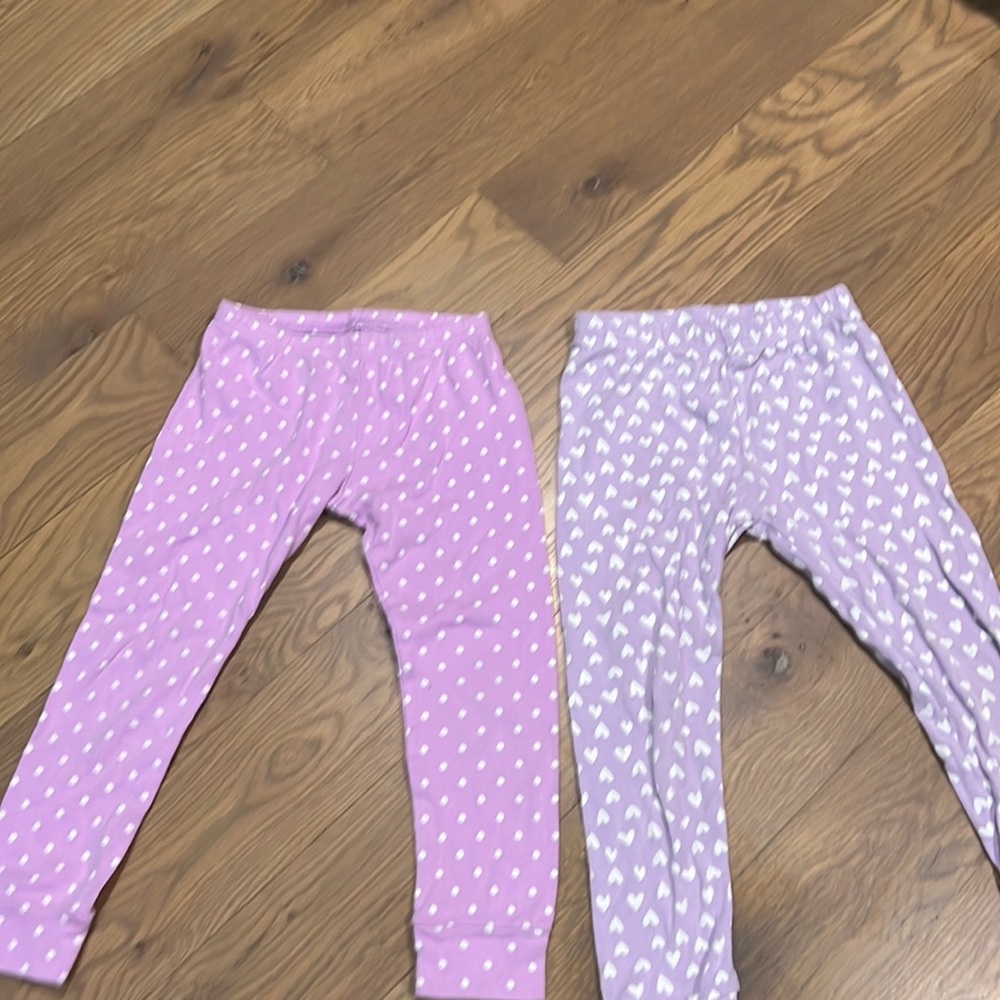 Two pair of Carter’s girls pants size 4 and size 4T package